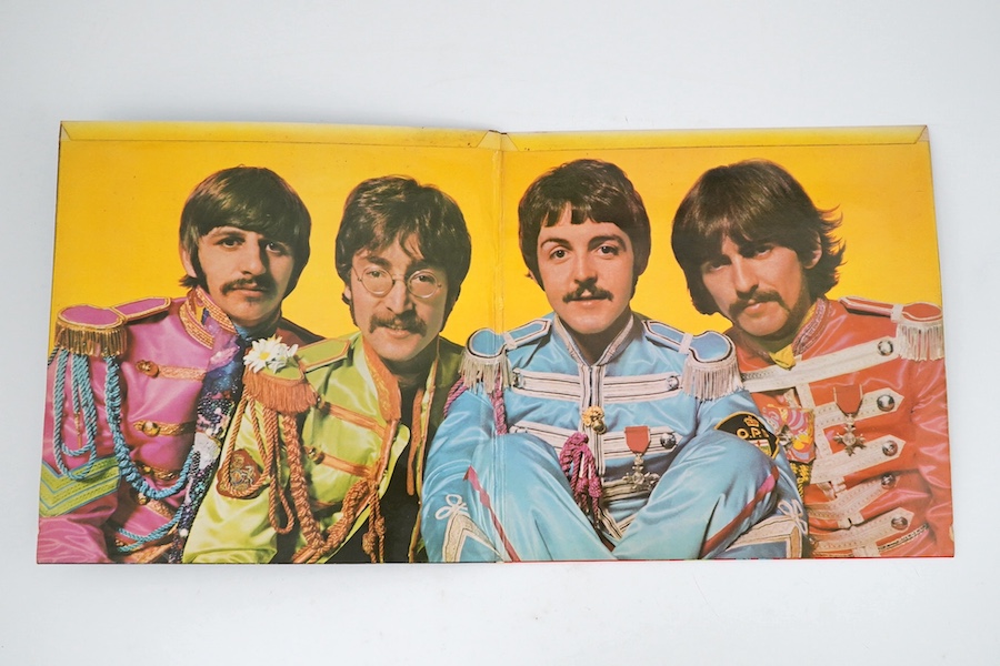 The Beatles; Sgt Pepper LP record album, mono on Parlophone PMC 7027, XEX 637-1, complete with card insert. Condition - fair